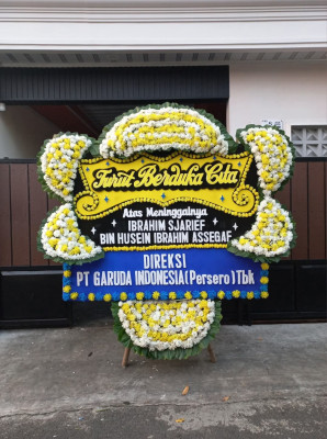 Papan Bunga Duka di Pining