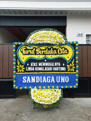 Papan Bunga Duka di Pining